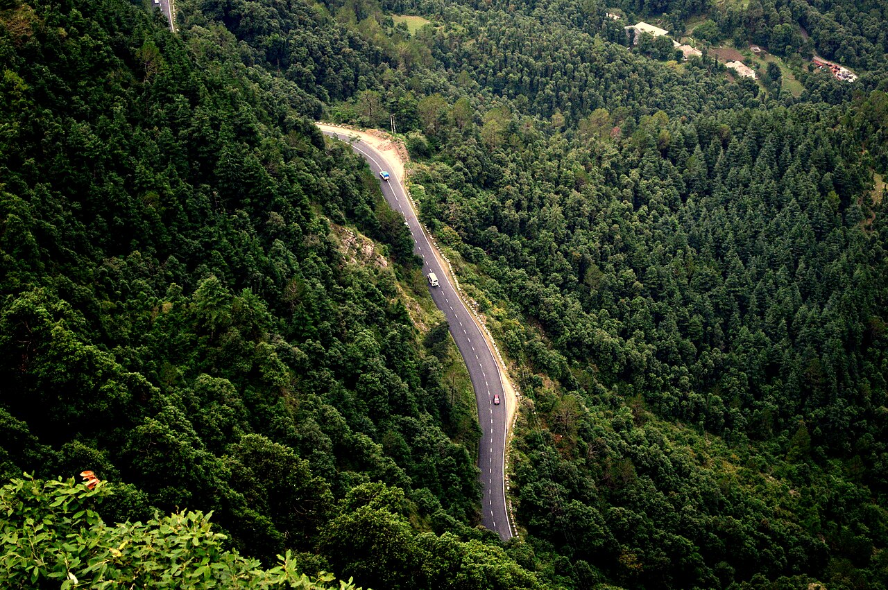 A mountain highway in Himachal Pradesh - every hill-road alignment is an intervention in terrain, drainage and geology. Photo: Darshan Simha, CC BY 2.0, via Wikimedia Commons.